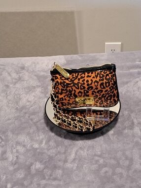 Betsey Johnson Orange and Black Leopard Print Mini Wristlet with Gold Plaque